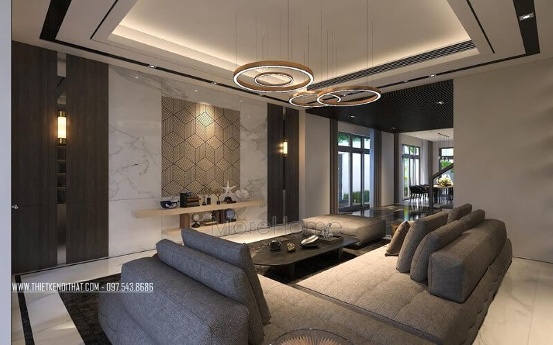 Đá kết hợp cùng gỗ ốp tường là một trong những xu hướng ấn tượng trong trang trí phòng khách hiện đại, cao cấp. Thiết kế nội thất