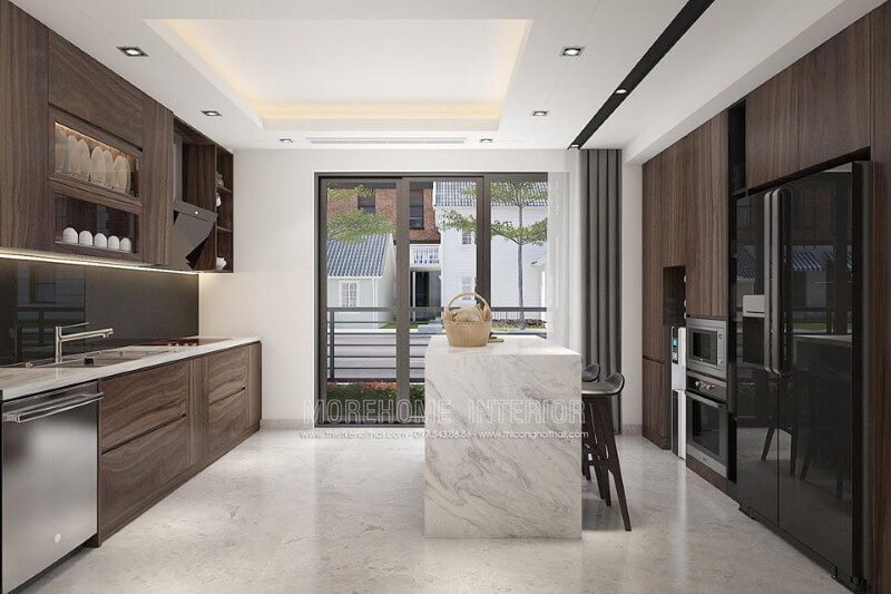 Bố trí phòng bếp ấn tượng với hệ cửa lớn giúp không gian trở nên thông thoáng. Thiết kế nội thất nhà liền kế đẹp sang trọng