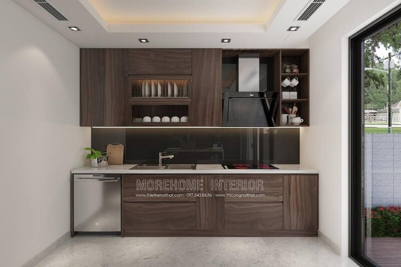 Mẫu tủ bếp với đường vân độc đáo cùng gỗ tối màu đã tạo nên không gian bếp hiện đại sang trọng. Thiết kế nội thất nhà liền kế đẹp sang trọng